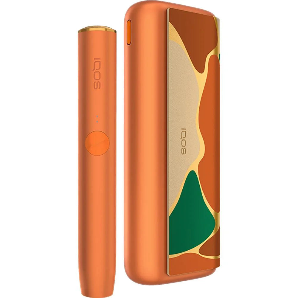 Orange IQOS ILUMA device with artistic multicolor case door panel.