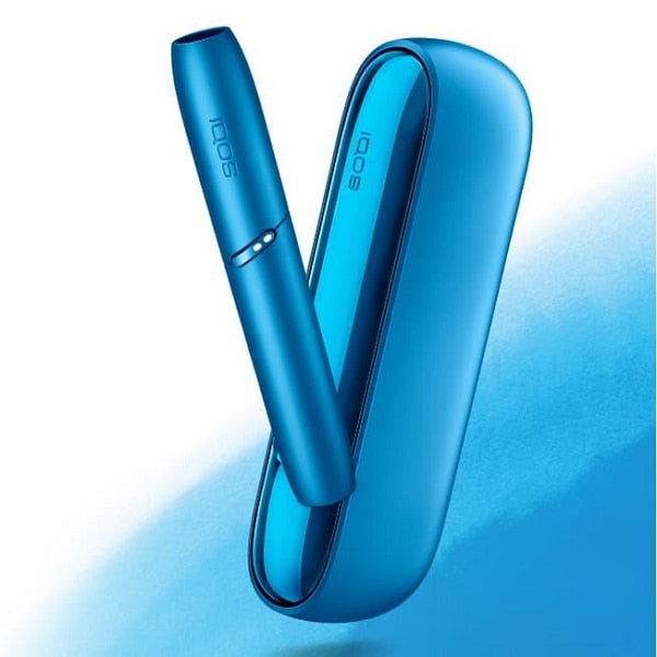 Bright blue IQOS device leaning from matching glossy blue charging case.
