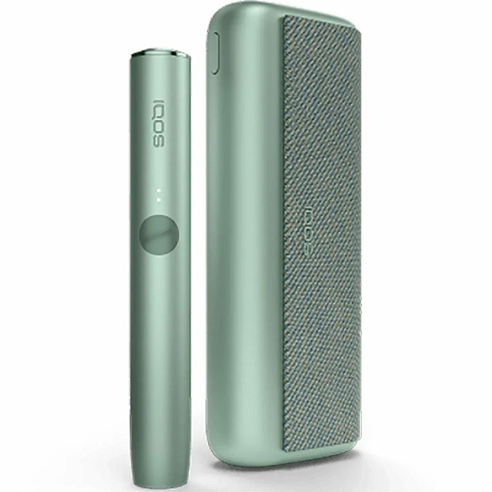 Mint green IQOS ILUMA device with matching case and textured fabric panel.