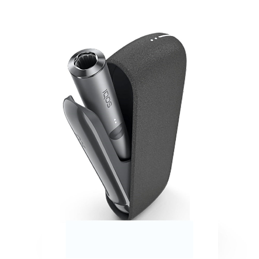 Open black IQOS ILUMA case with silver holder partially lifted from charger.