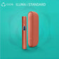 Orange IQOS ILUMA i STANDARD holder and case on teal background.
