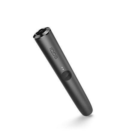 Single black IQOS ILUMA holder pen angled on white background.
