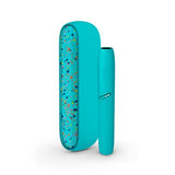 Turquoise IQOS case with paint-splatter design and matching holder.
