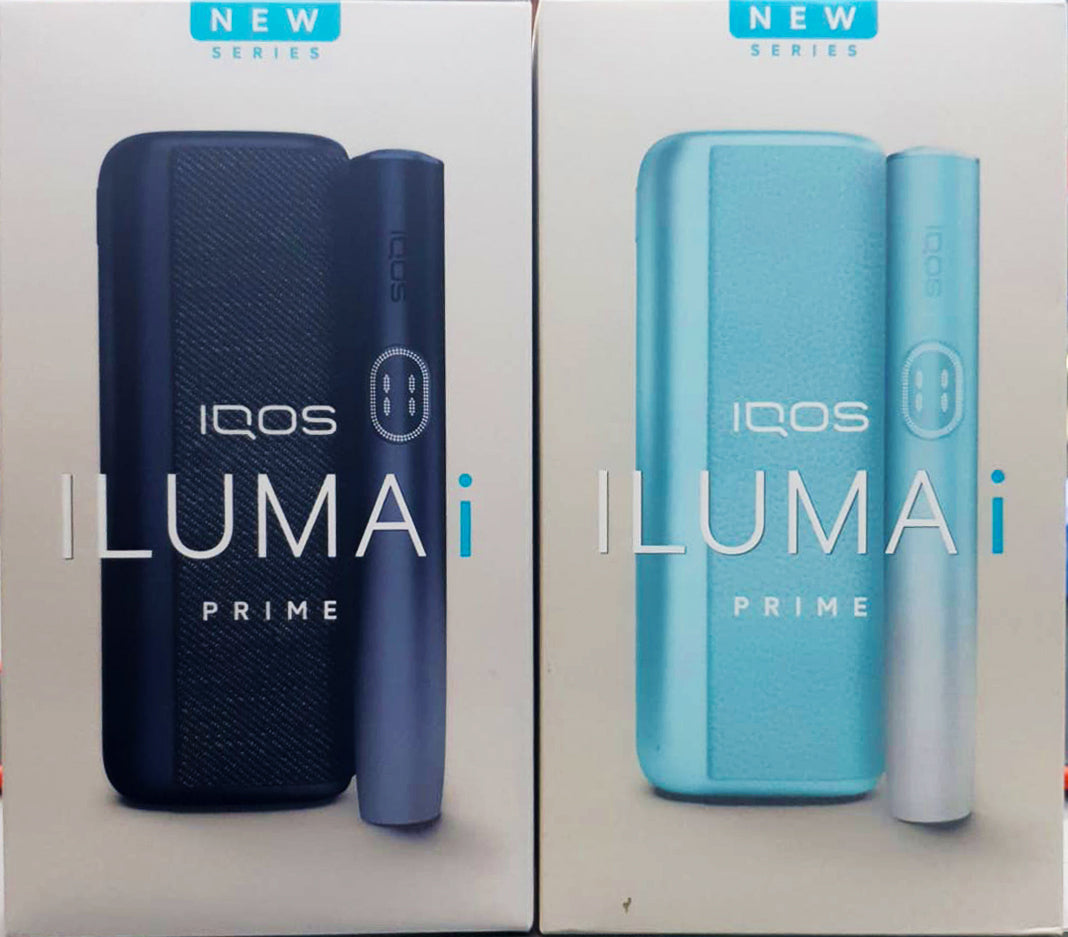 Two IQOS ILUMA i PRIME retail boxes featuring navy and aqua device colorways.
